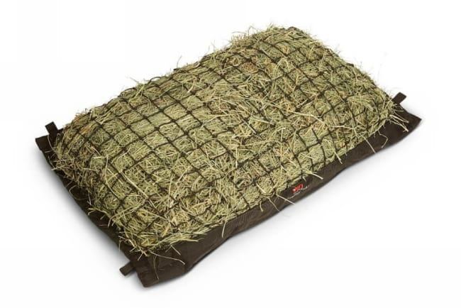Manger Hay Pillow Horse Trailer Hay Bag 1 3/4" mesh size filled with grass hay.
