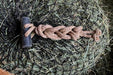 Use half hitch knot and add daisy chain knots to secure extra drawstring on slow feed hay net.